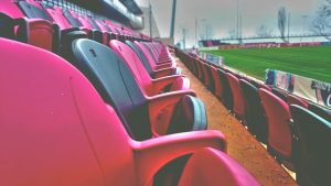 Red and Black Seats at Sports Field